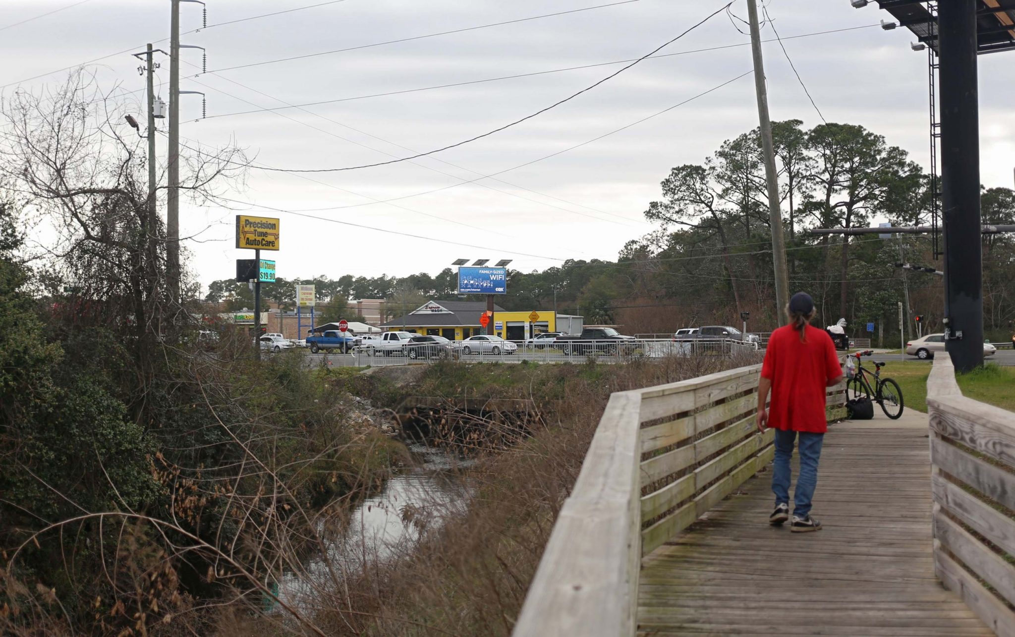 The Southwest Greenway has become a loitering spot for panhandlers and homeless along Navy Blvd in Warrington.