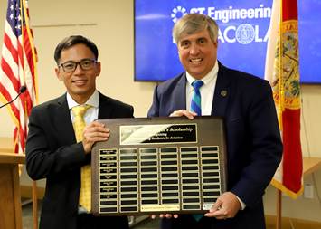ST Engineering Expands Scholarship Program to Support Students Pursuing Aviation-related Education in Escambia County, Florida Pensacola Mayor Grover Robinson (right) and ST Engineering Commercial Aerospace President Jeffrey Lam (left) at a ceremony announcing the expansion of the scholarship