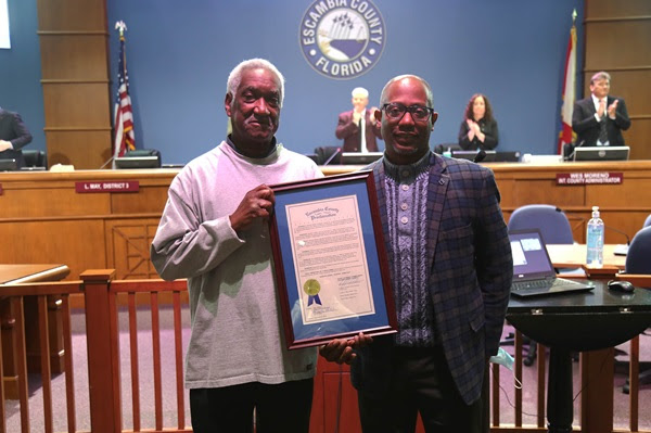 Escambia County Recognizes Feb. 11 as General Daniel “Chappie” James Day District 3 Commissioner Lumon May presents the proclamation for General Daniel Chappie James Day to Ellis Jones of the Chappie James Museum of Pensacola.