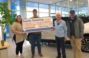 Sandy Sansing Gifts Lucky Customer $10,000