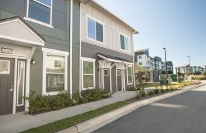 Capstone Building Corp. Announces Completion of $61.3 Million Luxury Apartment and Townhome Development